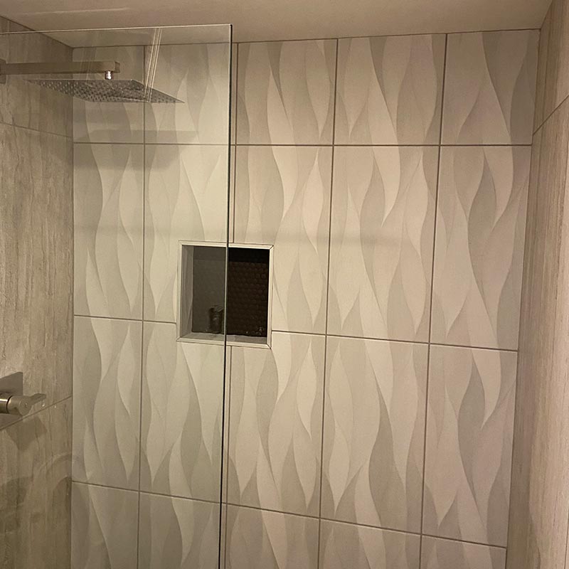 after photo of bathroom remodel with walk in shower