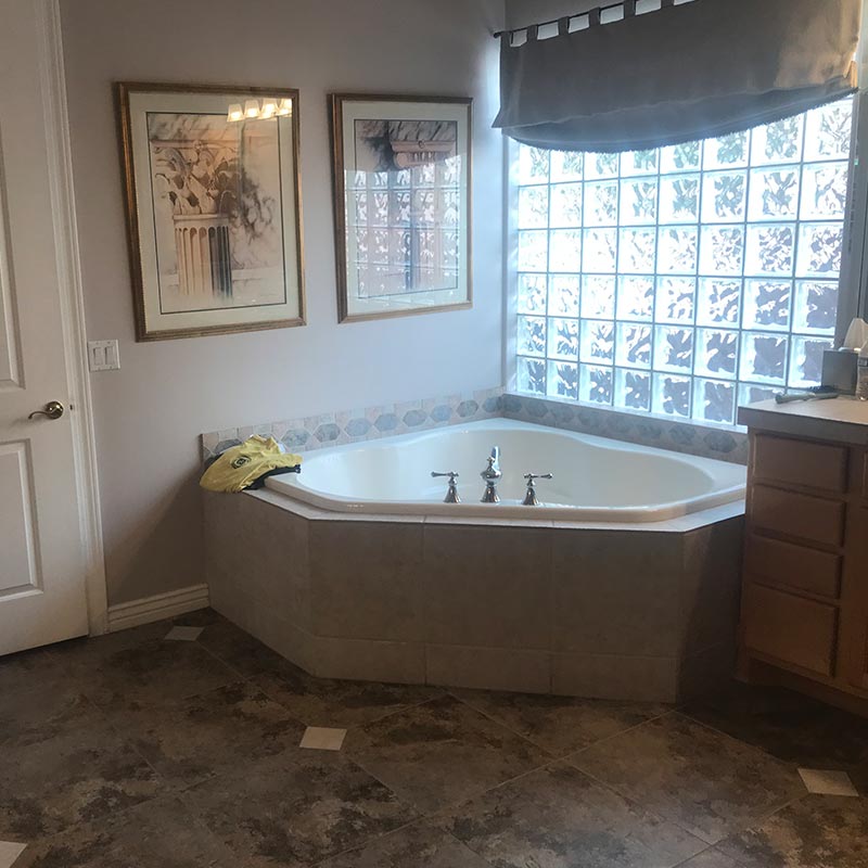 before photo of bathroom remodel with free standing tub